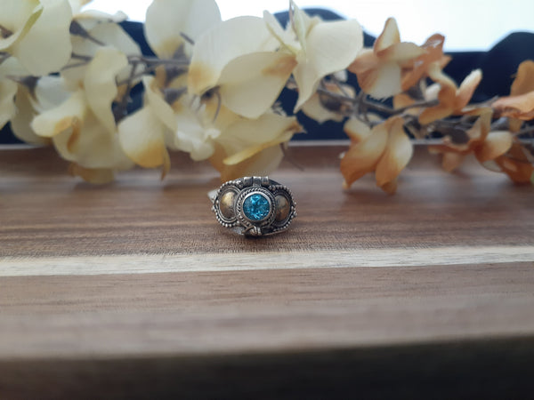 Poison Ring Faceted Circle Blue Topaz