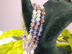 Melody Stone aka Super 7 Round Bead Bracelet 6mm